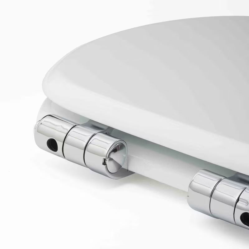 Bijela WC daska Glacera od MDF-a s tehnologijom soft Close i mesinganim šarkama