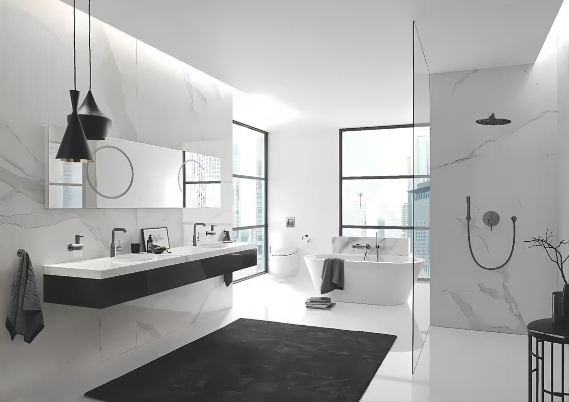 Podžbukna miješalica za tuš Grohe Essence New u izvedbi brushed hard graphite s 2-smjernim preusmjerivačem.