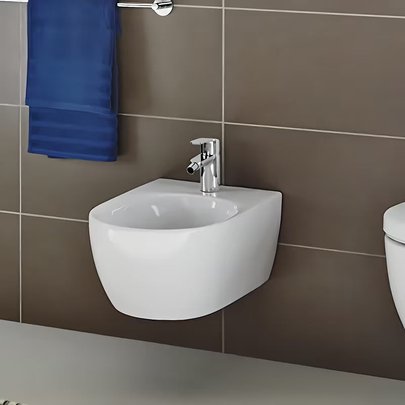 Kromirana miješalica za bide Grohe Eurostyle Cosmopolitan s odvodom i ručicom za upravljanje.