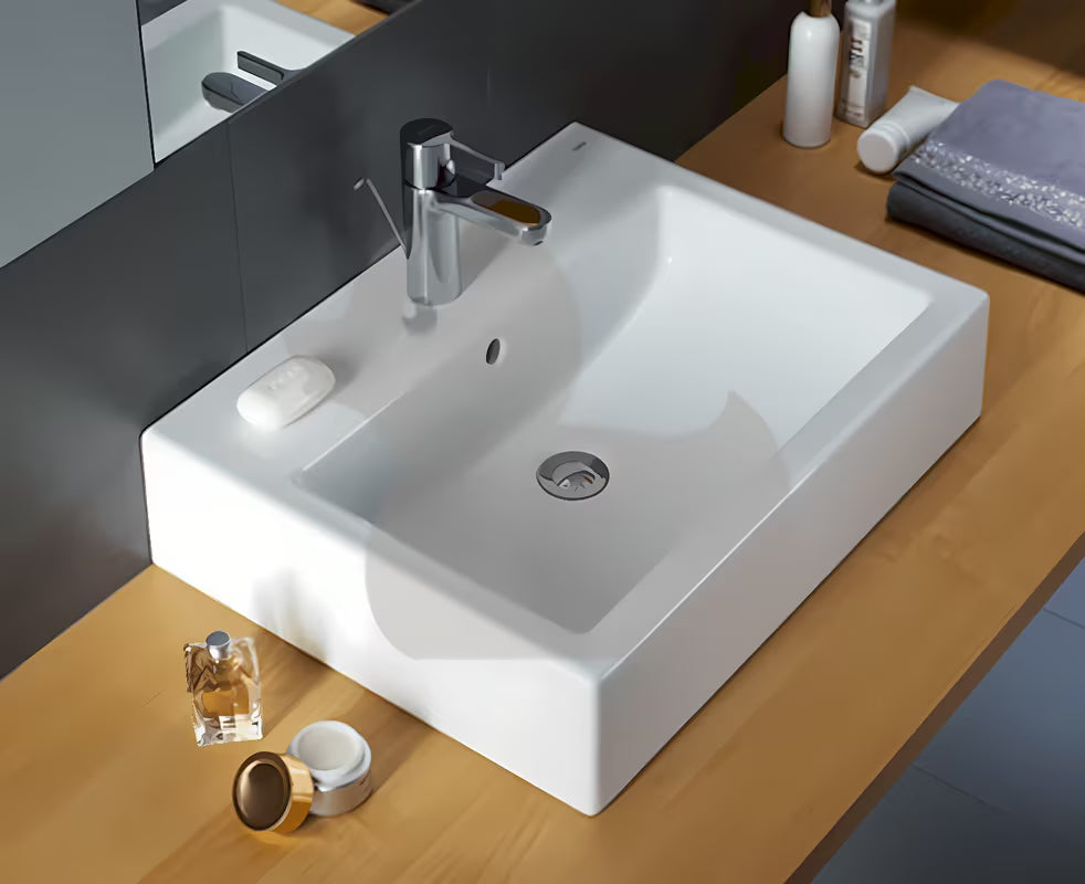 Bijeli kvadratni umivaonik Kolo Twins 60x46 cm sa središnjim otvorom za pro slavinu