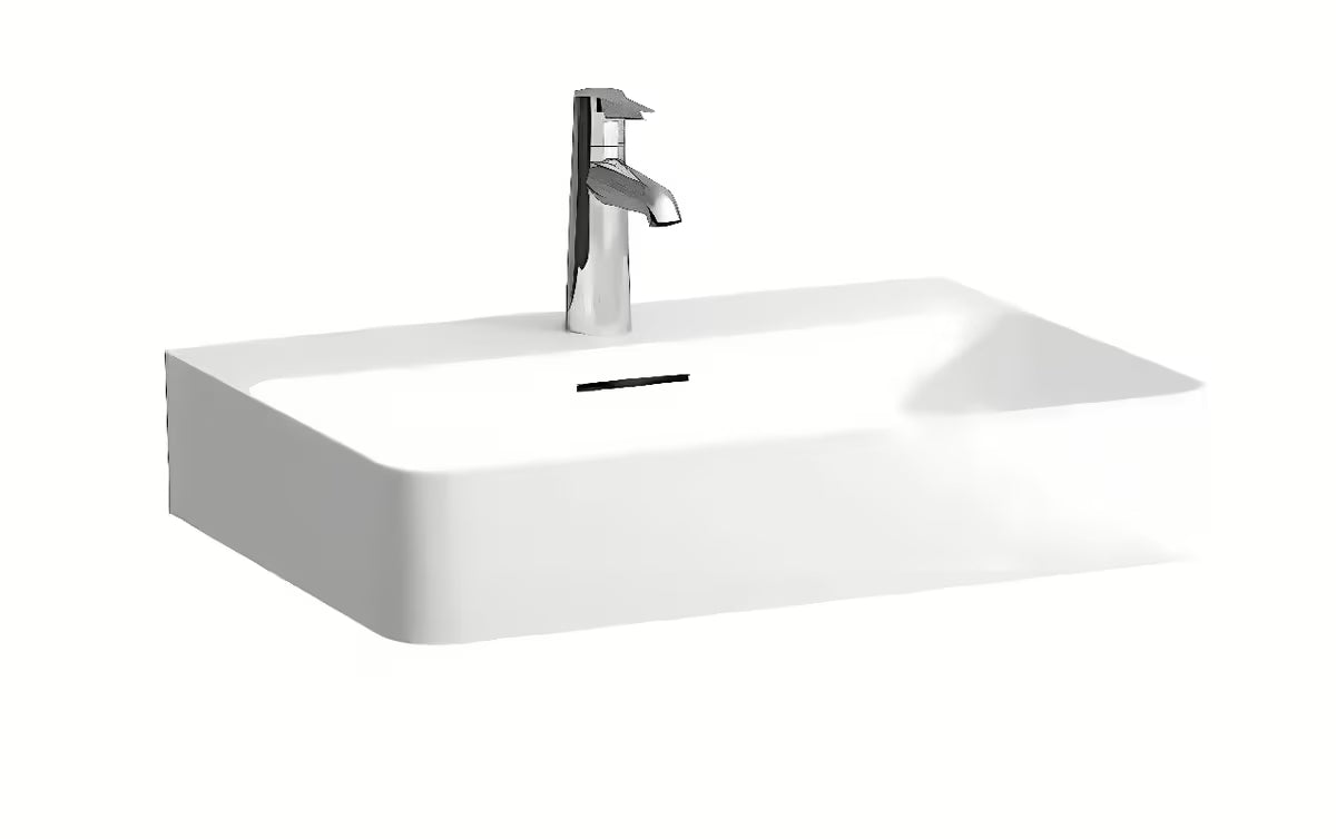 Bijeli keramički viseći umivaonik Laufen Val 60×42 cm s otvorom pro slavinu u sredini.