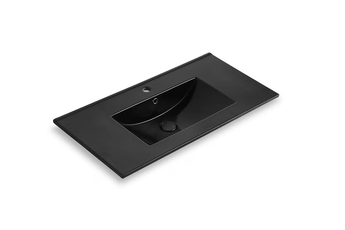 Crni keramički umivaonik za kupaonski ormarić Naturel Modena 81 x 46 cm s otvorom za slavinu u sredini.