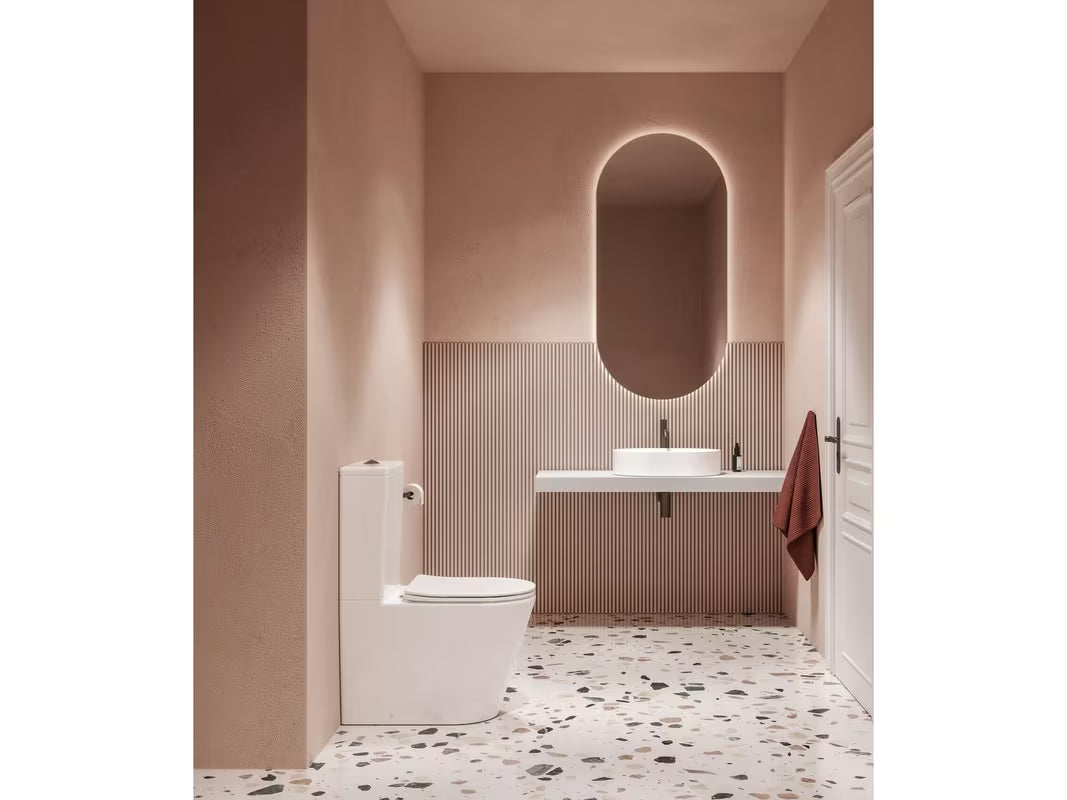 Bijeli samostojeći WC kombi Ravak Elegant RimOff s wc daskom soft Close i dvokoličinskim ispiranjem 3/6 l.