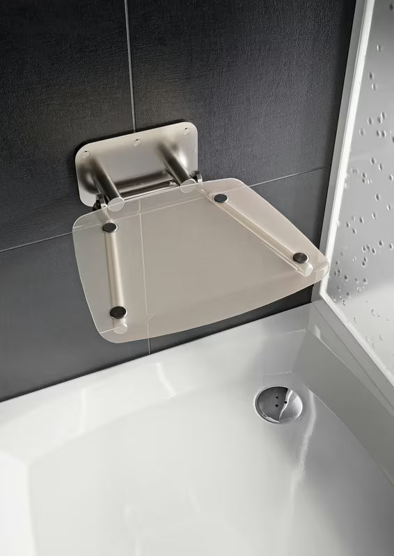 Sklopive sjedalo za tuš Ravak Ovo B II s konstrukcijom od nehrđajućeg čelika i prozirnim sjedalom Clear.