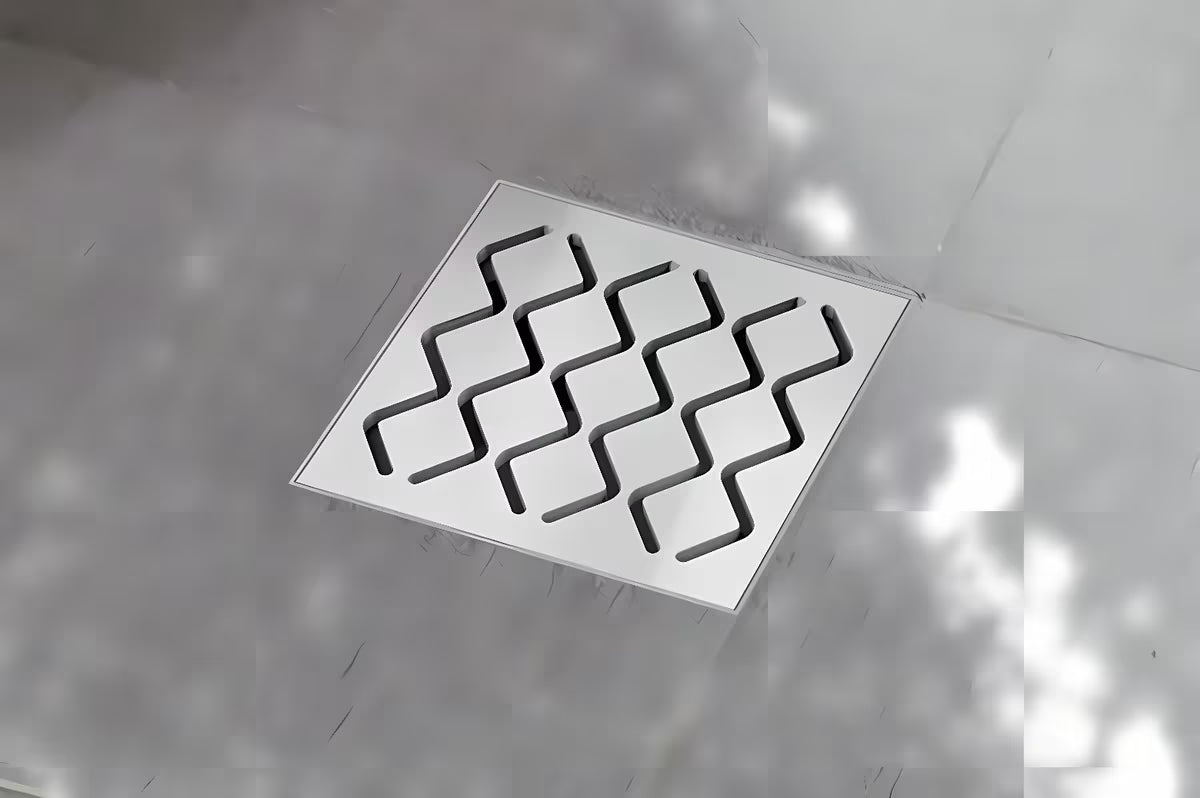 Podni sifon/slivnik Ravak SN501 s plastičnim tijelom i rešetkom od nehrđajućeg čelika, promjer 10,5 cm.