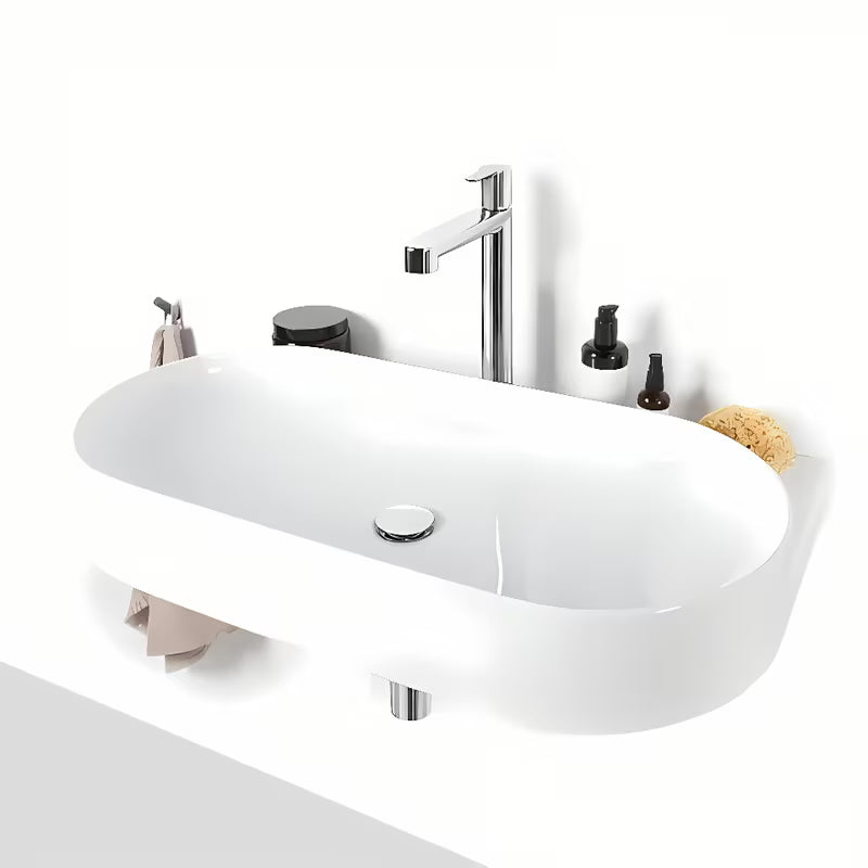 Bijeli keramički ugradbeni umivaonik Ravak Yard 80,5x50 cm s minimalističkim oblikom i odlagališnom plohom