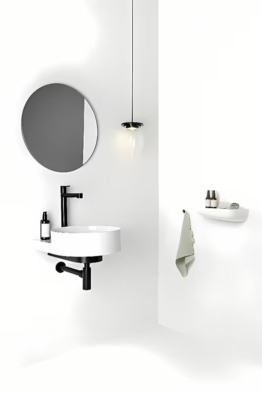 Bijeli keramički viseći umivaonik Ravak Yard 40 bez preljeva s otvorom pro za stojeću slavinu.