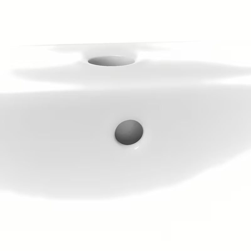 Bijeli viseće keramički umivaonik Roca Nexo s preljevom i otvorom pro za slavinu u sredini