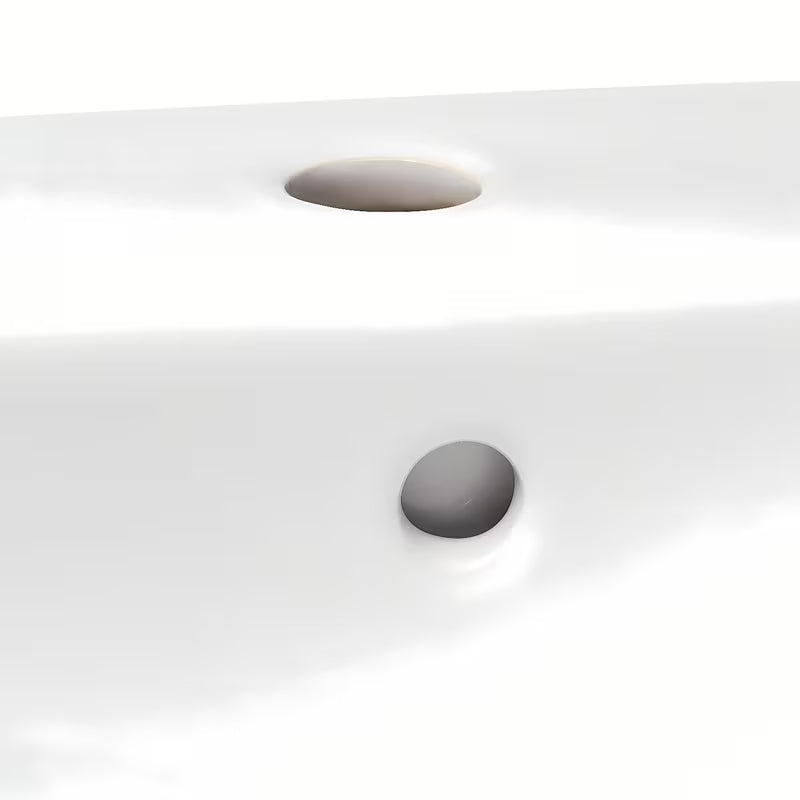 Keramički viseći umivaonik Roca Nexo bijele boje s preljevom i otvorom pro za slavinu u sredini