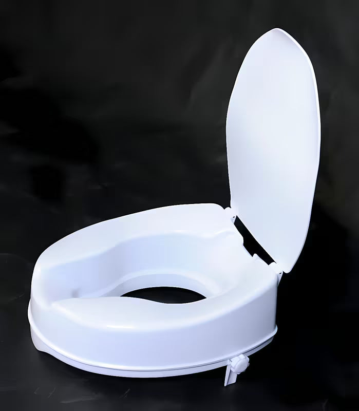 Bijelo povišeno WC daska Ridder od polipropilena pro za udobnije sjedenje i ustajanje