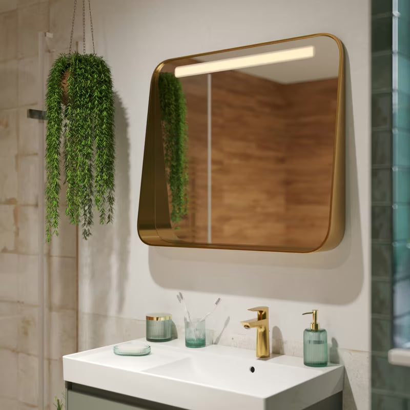 Zeleni samostojeći dozator sapuna SAT Boho sa zaobljenim oblikom i sjajnom površinom od metala i stakla.