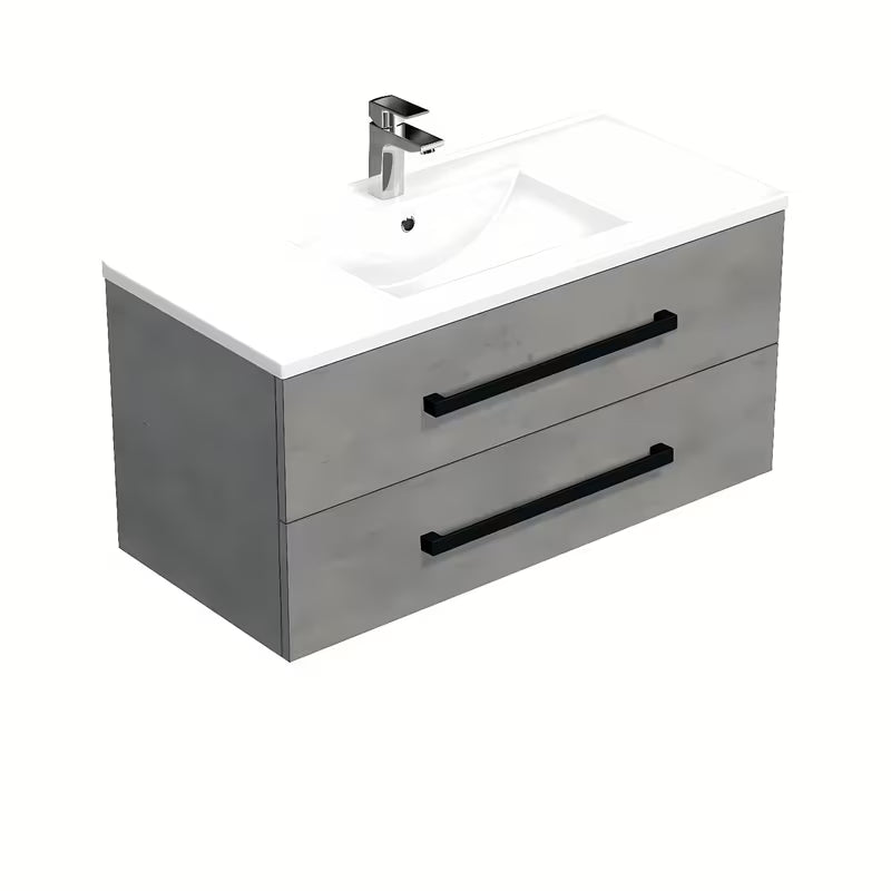 Viseća kupaonski ormarić SAT Cube Way s keramičkim umivaonikom u dekoru imitacije betona i crnim ručkicama.