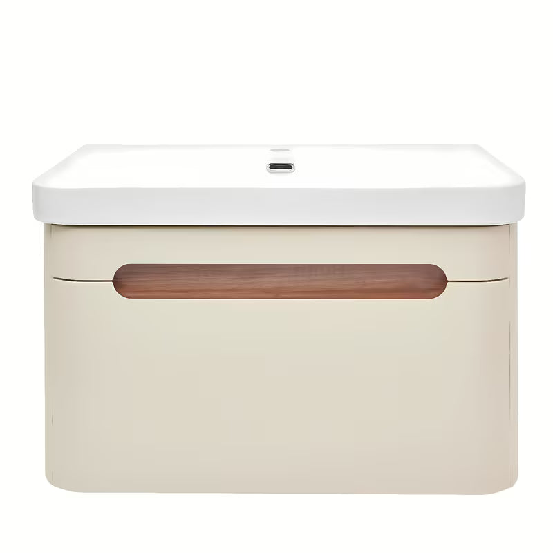 Viseća ormarić s umivaonikom SAT Fusion u mat pješčano bež boji s utičnicom i s bijelim sjajnim umivaonikom.