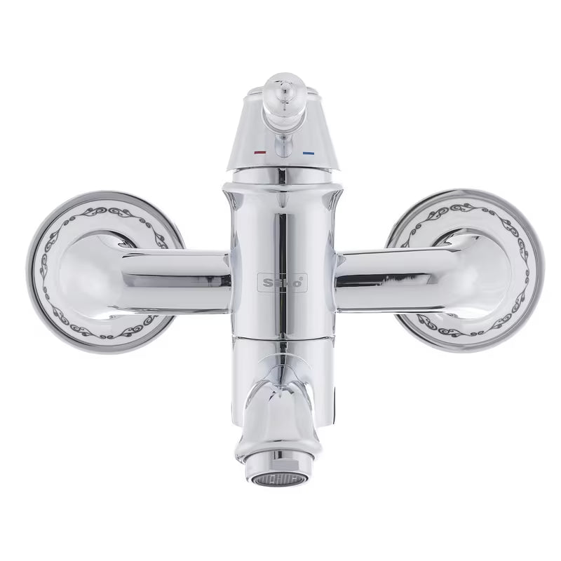 Kromirana jednoručna baterija zidna miješalica za kadu SIKO Provence u retro dizajnu s preklopnikom skrivenim u izljevu.