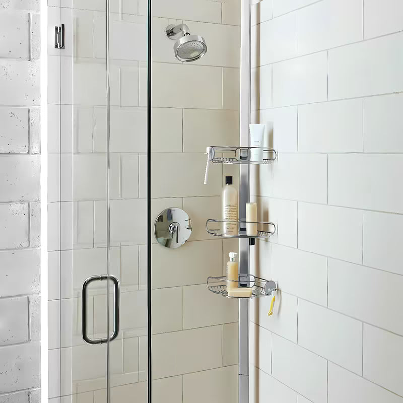 Podesiva tuš šipka Simplehuman Shower caddy sa žičanim policama za kutnu ugradnju od nehrđajućeg čelika.