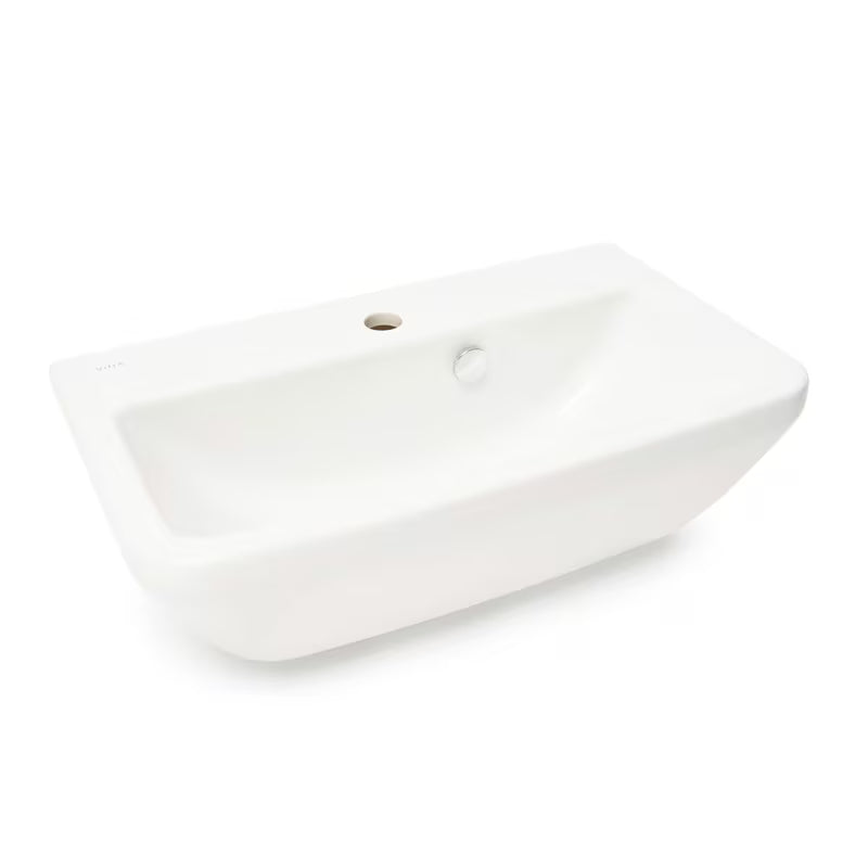Bijeli viseći umivaonik Vitra Integra 60x36 cm od keramike s otvorom pro za slavinu u sredini i preljevom.