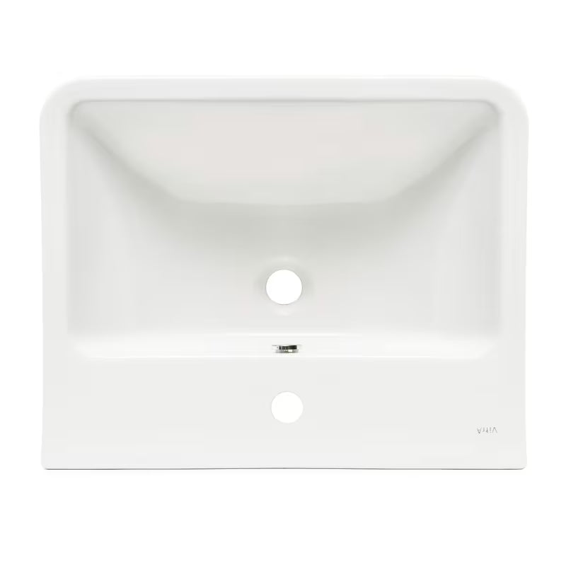 Bijeli viseće keramički umivaonik vitra Integra 55x45 cm s otvorom pro za slavinu u sredini i preljevom.