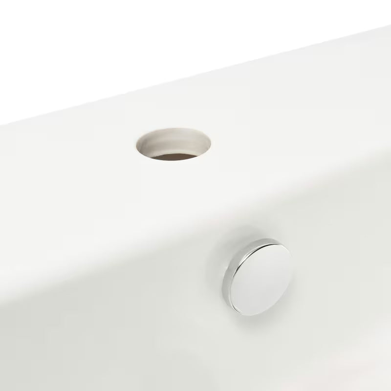 Bijeli viseće keramički umivaonik vitra Integra 55x45 cm s otvorom pro za slavinu u sredini i preljevom.