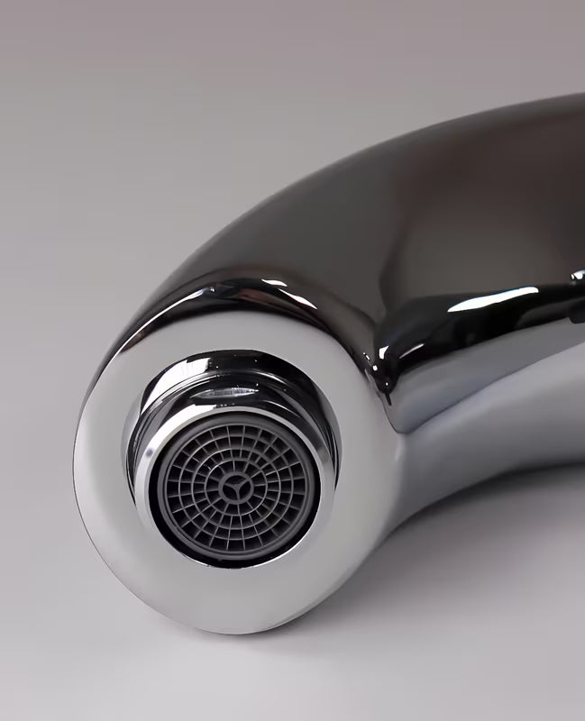 Kromirana senzorska miješalica za umivaonik Weltservis Donner s infracrvenim aktiviranjem i ručnim upravljanjem temperaturom.