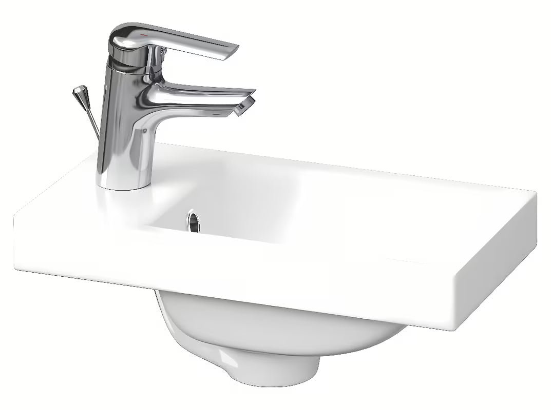 Bijeli umivaonik za kupaonski ormarić Cersanit Como 40x22 cm od keramike s otvorom za pro slavinu u sredini.