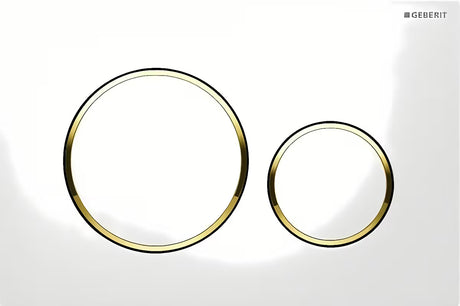 Geberit Sigma20 dvokoličinska tipka za aktiviranje u bijeloj boji sa zlatnim prstenovima pro vodokotlića Geberit Sigma.