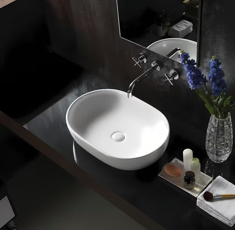 Bijeli keramički umivaonik na ploču Glacera Vallone 59 x 41 cm bez preljeva.