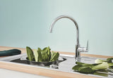 Kromirana miješalica za sudoper Grohe baucurve s visokim izljevom i zakretnim izljevom 360°