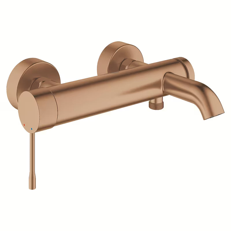 Zidna miješalica za kadu Grohe Essence New u završnoj obradi Brushed Warm Sunset s preklopnikom kada/tuš.