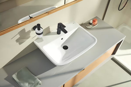 Dozator sapuna Grohe Essentials u mat crnoj izvedbi sa staklenom posudicom i metalnim držačem