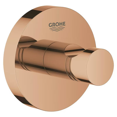 Kukica za ogrtač Grohe Essentials u izvedbi warm sunset sa skrivenim pričvršćenjem i površinom Grohe StarLight.