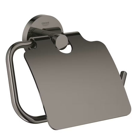 Držač toaletnog papira Grohe Essentials s poklopcem u izvedbi hard graphite sa skrivenim pričvršćenjem.