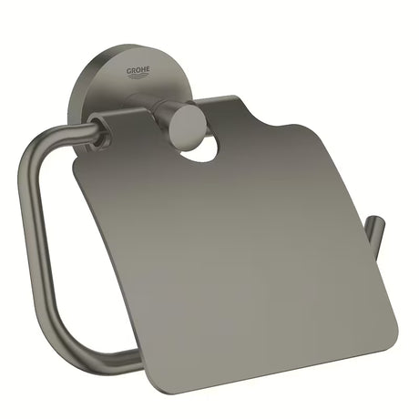 Držač toaletnog papira Grohe Essentials s poklopcem u izvedbi Brushed Hard Graphite sa skrivenim pričvršćenjem.
