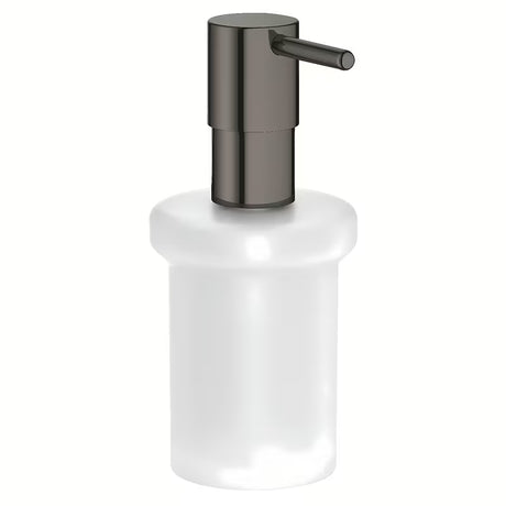 Dozator sapuna Grohe Essentials bez držača u izvedbi hard graphite, staklena posuda i metalni elementi.