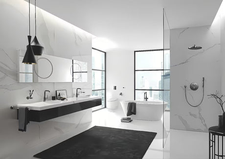 Dozator sapuna Grohe Essentials bez držača u izvedbi hard graphite, staklena posuda i metalni elementi.