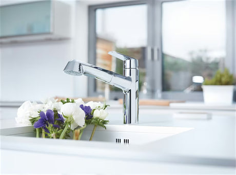 Kromirana miješalica za sudoper Grohe Eurodisc Cosmopolitan s izvlačivim tušem i zakretnim izljevom