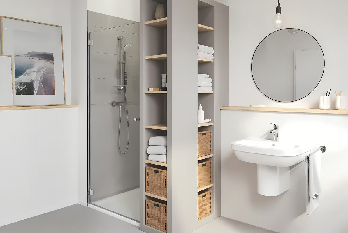 Kromirani jednoručna baterija stojeća miješalica za umivaonik Grohe Eurosmart New s click‑clack-odvodom.