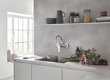 Grohe Eurosmart New jednoručna baterija zidna miješalica za sudoper u krom izvedbi s okretnim izljevom.
