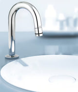 Kromirani ventil za umivaonik Grohe Universal s odvodom s izljevom u obliku slova C i funkcijom start/stop