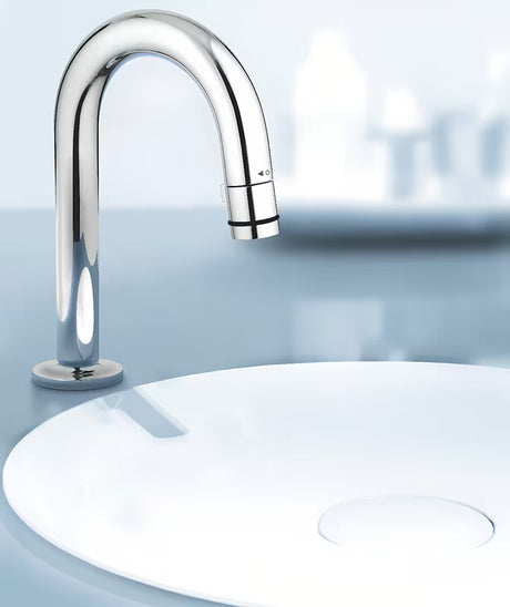 Kromirani ventil za umivaonik Grohe Universal s odvodom s izljevom u obliku slova C i funkcijom start/stop