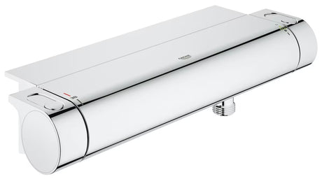 Kromirani termostatska miješalica za tuš Grohe Grohtherm 2000 s policom EasyReach pro za jednostavno upravljanje.
