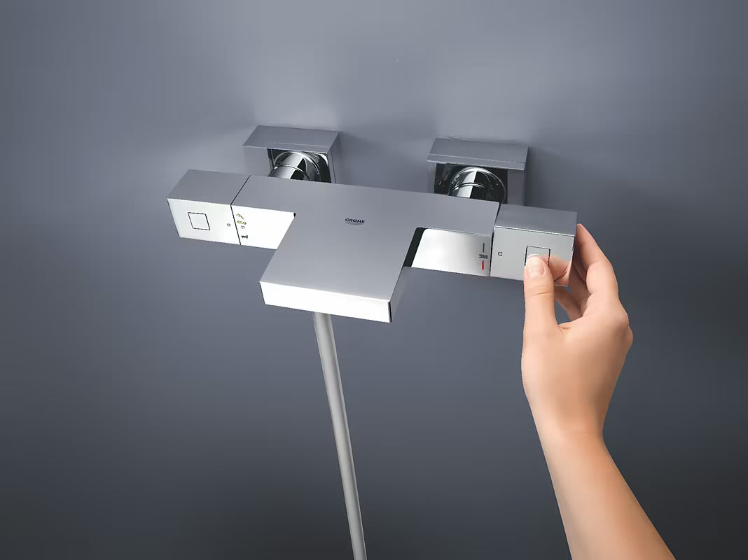 Kromirana termostatska miješalica za kadu Grohe Grohtherm Cube s XL izljevom GROHE XL Waterfall pro za kadu i tuš.
