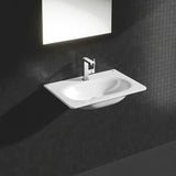 Kromirana jednoručna baterija miješalica za umivaonik Grohe Plus s okretnim izljevom i odvodnim setom
