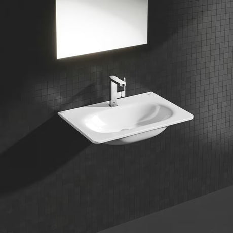 Kromirana jednoručna baterija miješalica za umivaonik Grohe Plus s okretnim izljevom i odvodnim setom