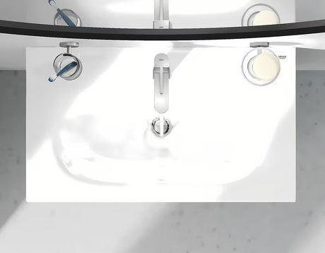 Umivaonička jednoručna baterija slavina Grohe Plus u izvedbi supersteel sa zakretnim izljevom i odvodnom garniturom.