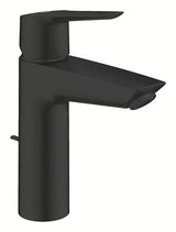 Mat crna jednoručna baterija miješalica za umivaonik Grohe Start za stojeću montažu s odvodnim setom.