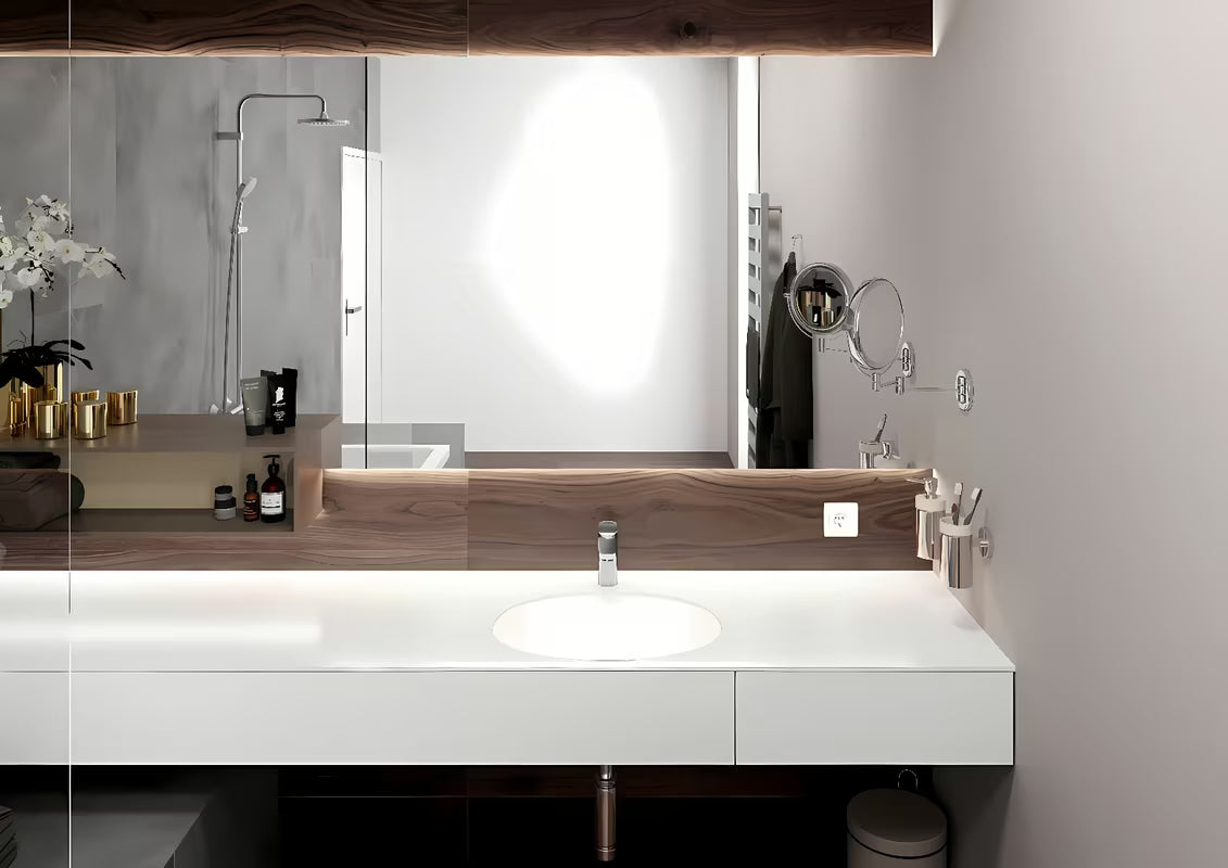 Kromirana jednoručna baterija miješalica za umivaonik Hansgrohe Vernis Blend 100 s odvodom i poteznom šipkom.