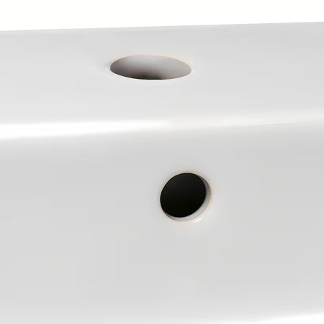 Bijeli viseći umivaonik Ideal Standard Strada 50x42 cm s preljevom i otvorom pro za slavinu u sredini.