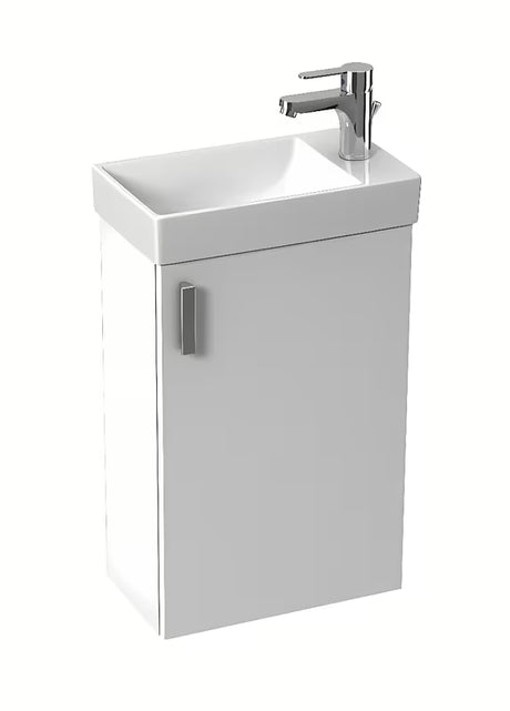 Bijeli viseća ormarić Jika Petit s keramičkim umivaonikom u minimalističkom dizajnu