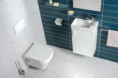 Bijeli viseća ormarić Jika Petit s keramičkim umivaonikom u minimalističkom dizajnu