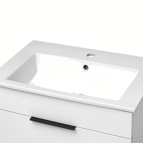 Bijeli viseća ormarić Jika Plan s keramičkim umivaonikom i ladicama s potpunim izvlačenjem.